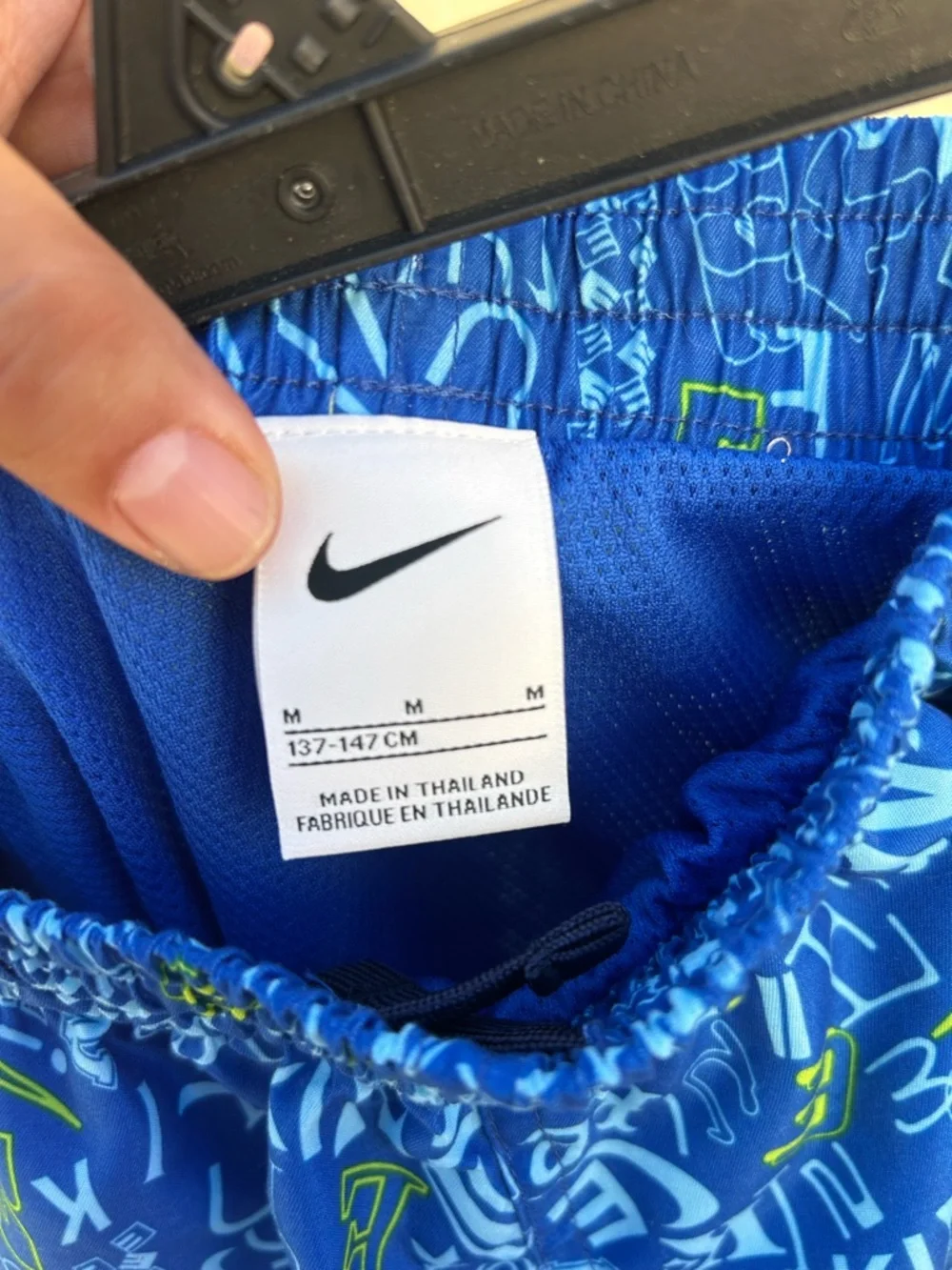 Nike Boys Blue Graphic Swim Shorts with Green Accents